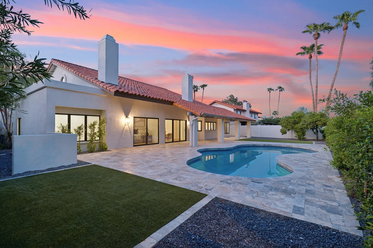 Backyard and pool at Trailhead at sunset