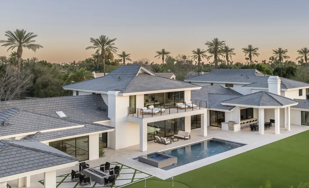 Aerial view of the Vaquero home with pool and lawn