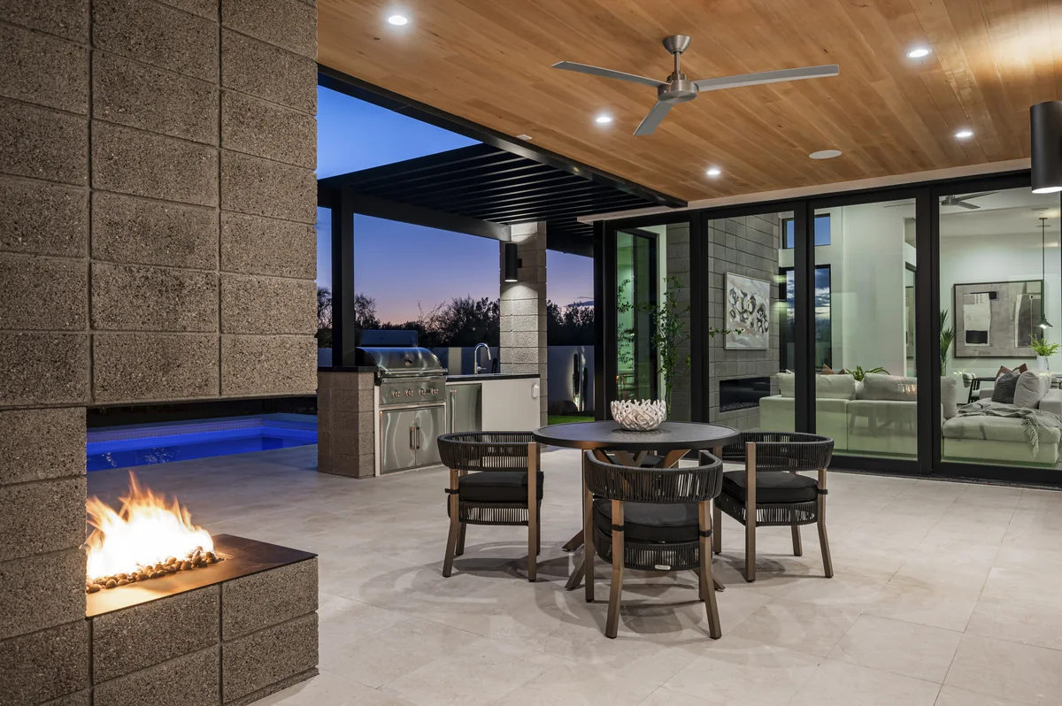 Covered ramada at La Posada with outdoor kitchen and fire feature